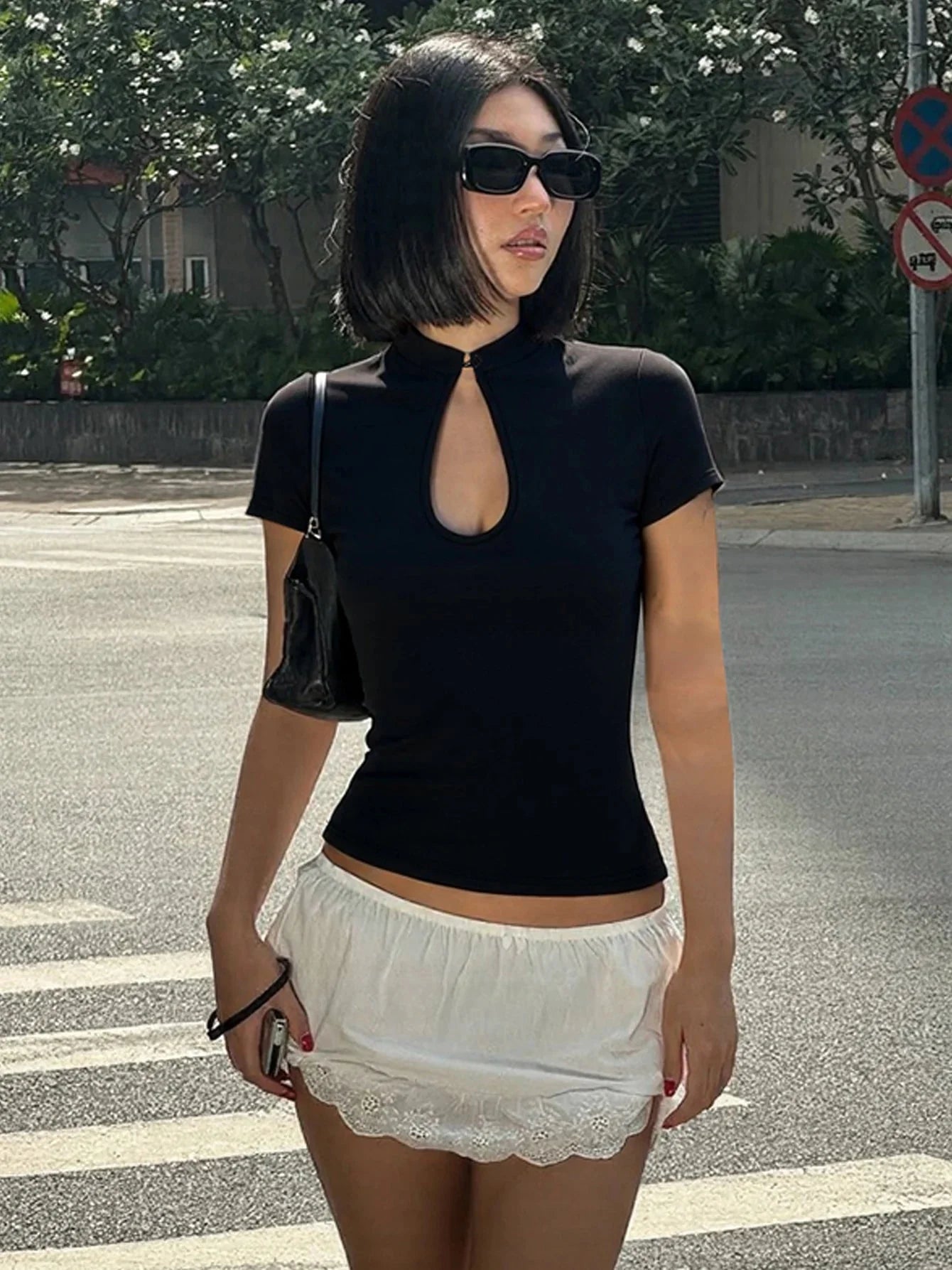 Ariane Bluse mit Stehkragen und Knotenknöpfen